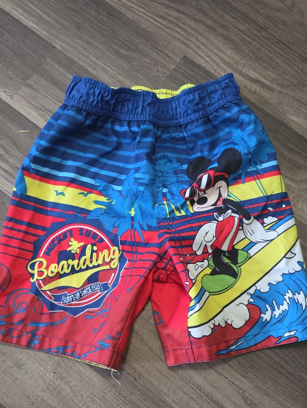 Disney Mickey Mouse Surfing Swim Shorts in Blue, Red & Yellow Size 4T